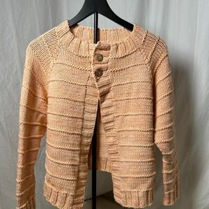 Peachy pink knit cardigan with button front and ribbed‎ details hand knit